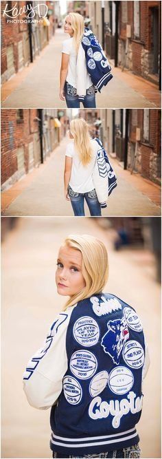 Asian girl wearing letter jacket