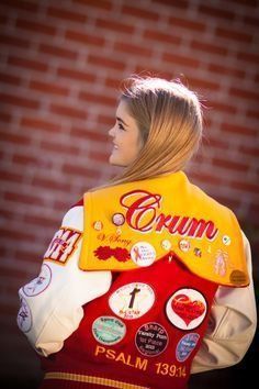 Asian girl wearing letter jacket