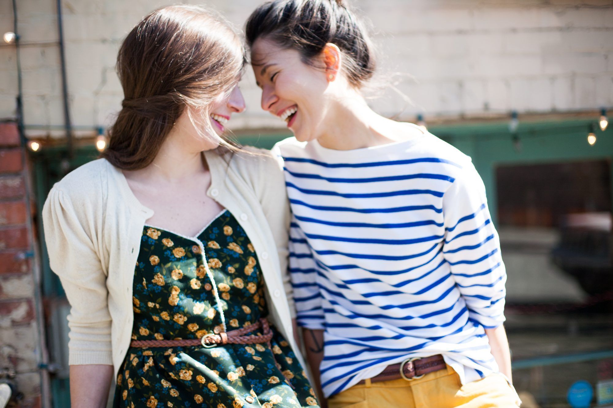 Lesbian hugging straight friend