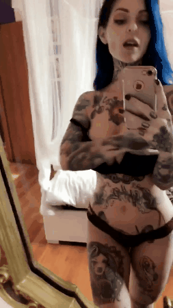 Brunette chick with tattoo and nice tits masturbates